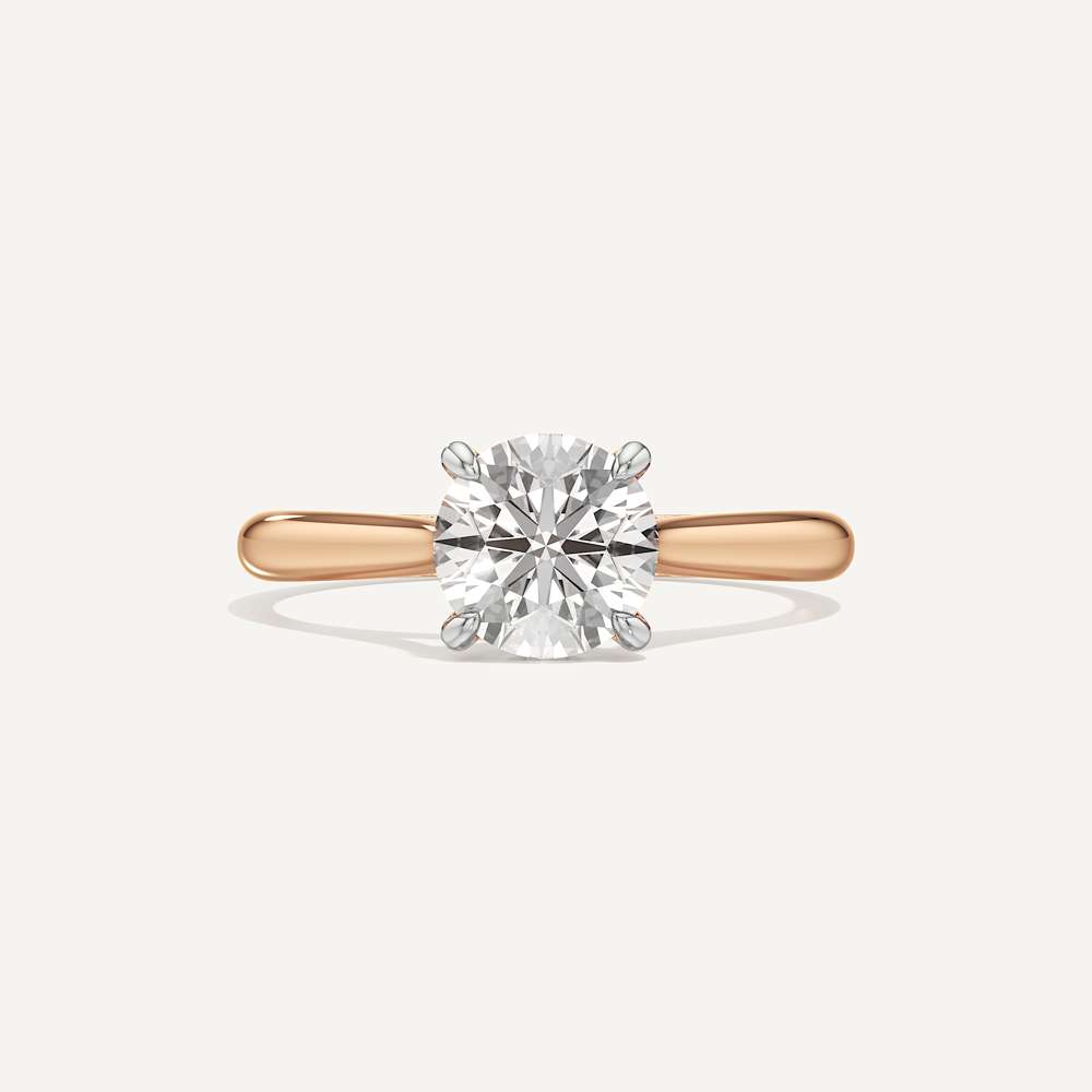 Held Round Solitaire Diamond